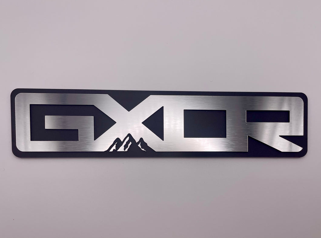 Emblema del vehículo GXOR